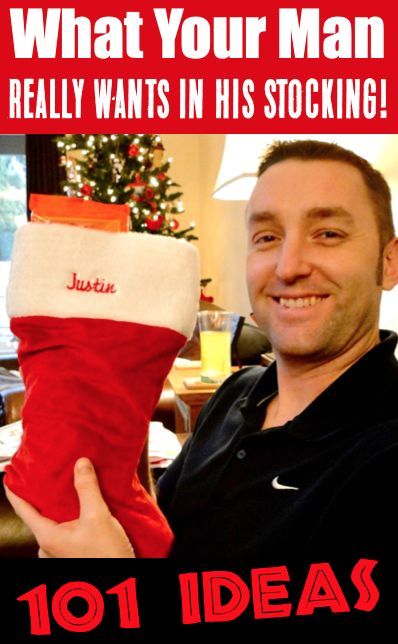 a man holding up a christmas stocking with the words 1011 ideas on it