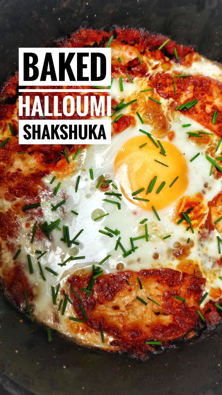 an egg on top of some sort of pizza in a pan with the words baked halloumi shakshuka above it