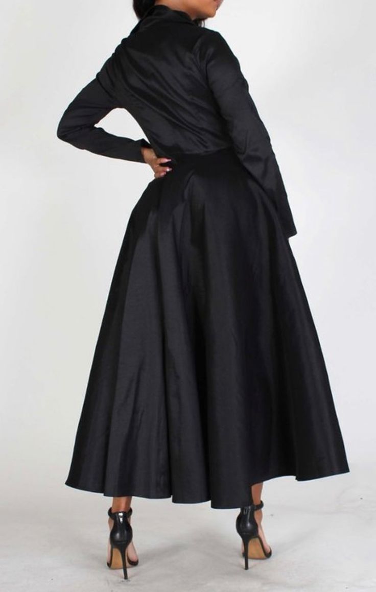 Solid long body jacket with V-neck closure Front button closures Long sleeves Cinched waist Full pleated skirt in a loose fit Polyester 95% Spandex 5% Trench Coat Style, Coat Style, Cinched Waist, Nun Dress, Pleated Skirt, Black Friday, Trench Coat, Loose Fitting, Long Sleeves