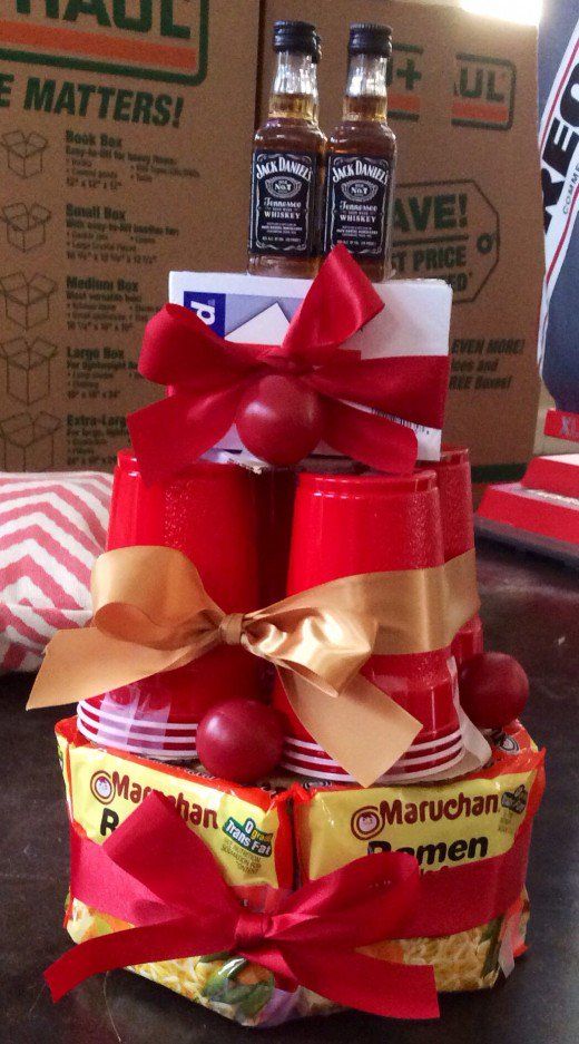 a gift basket made out of cups and candy