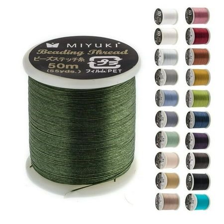 thread spooling thread with various colors and sizes for sewing, including dark green