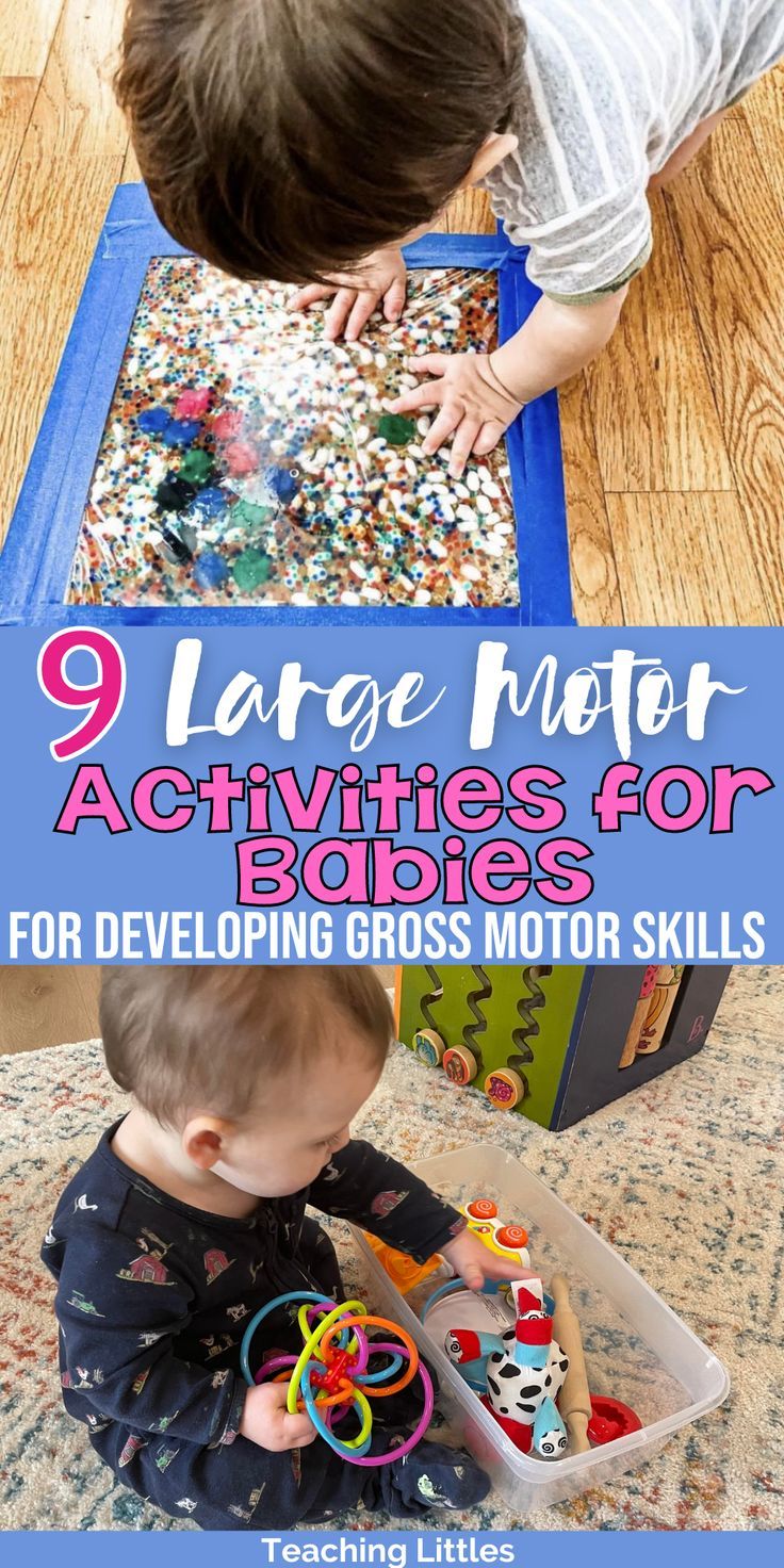 a toddler playing with toys on the floor in front of a blue box that says,