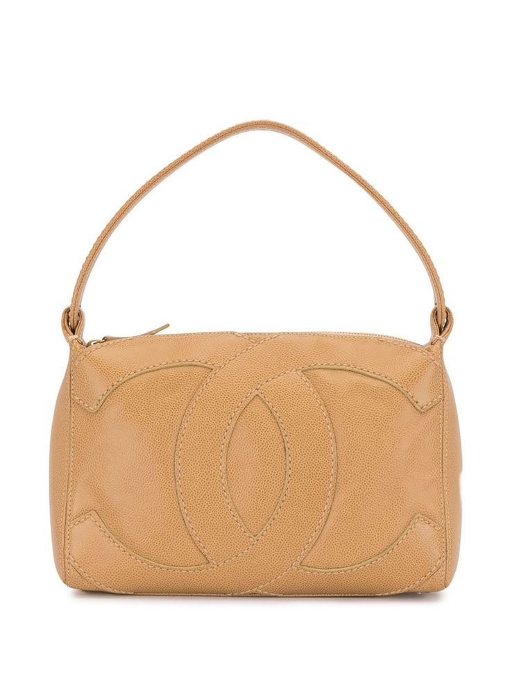 Beige leather Jumbo CC shoulder bag from Chanel Pre-Owned featuring gold-tone hardware, signature interlocking CC logo, metal feet, top zip fastening, single shoulder strap, internal zip pocket, internal logo patch and logo-print lining. Please be mindful that this piece has led a previous life, and may tell its story through minor imperfection. Purchasing this item continues its narrative, so you can be confident that you’re making a POSITIVELY CONSCIOUS choice for the planet. Modern Bag, Fashion Idol, Bag Display, Chanel Purse, Shopping Chanel, Previous Life, Heart Locket, Cc Logo, Vintage Chanel