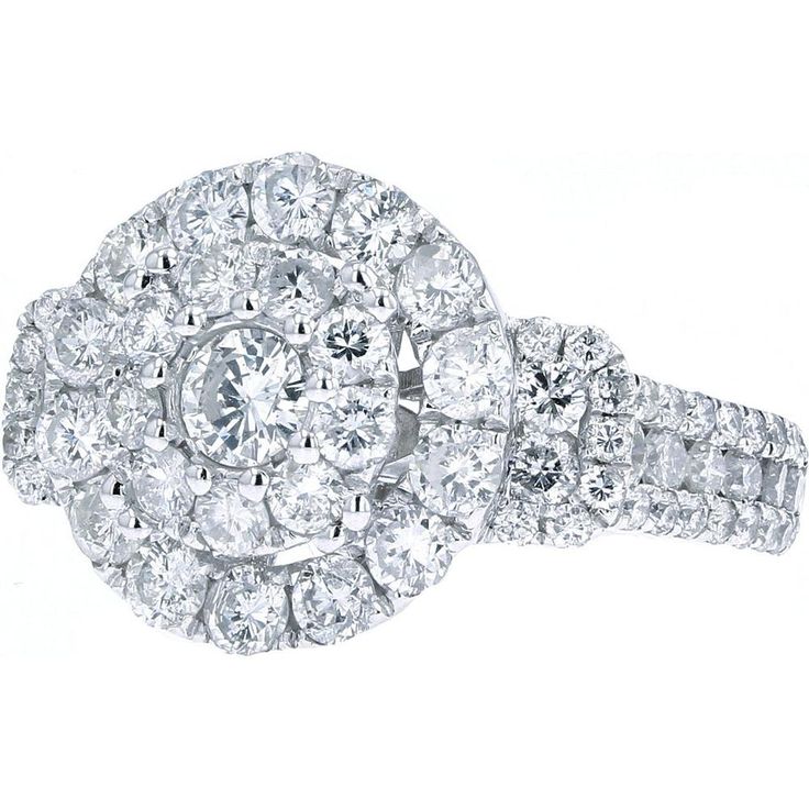 an oval shaped diamond ring with two rows of round diamonds in the center and sides