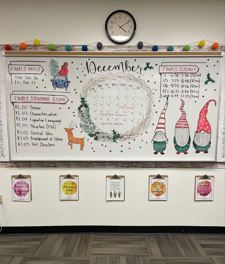 a bulletin board with calendars on it and christmas decorations around the clock hanging from the wall