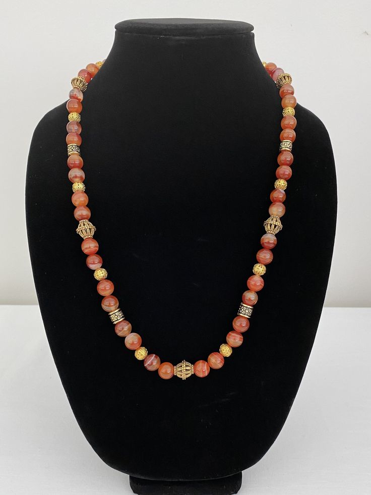 Handmade coral agate necklace with gold accent. Easy on and off magnetic clasp. Gold Hand-strung Agate Necklace, Gold Agate Single Strand Beaded Necklace, Gold Single Strand Agate Necklace, Gold Necklace With Large Red Coral Beads, Great Falls, Agate Necklace, Gold Accent, Magnetic Clasp, Gold Accents