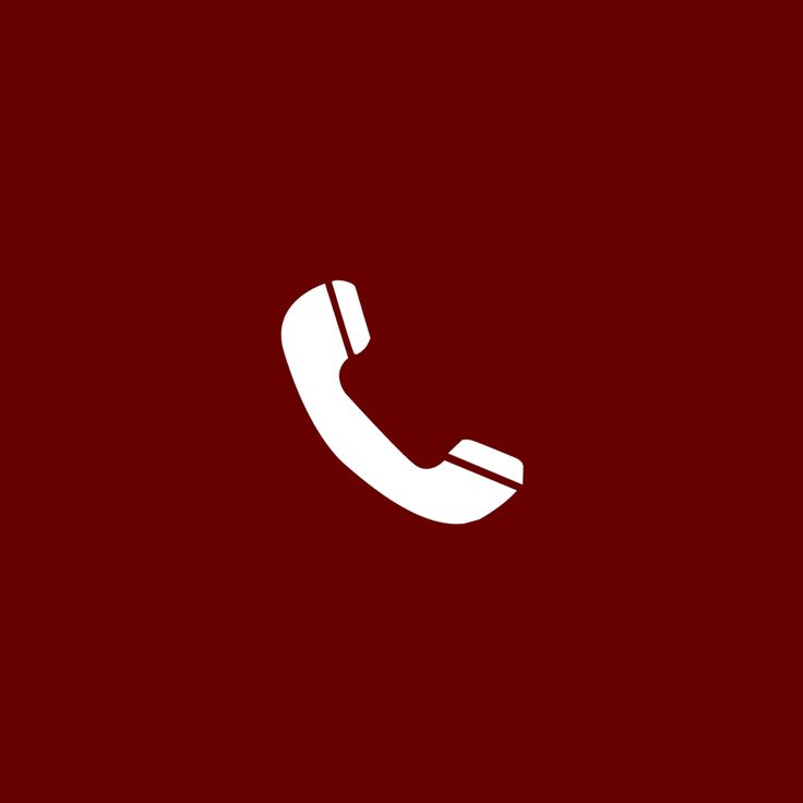 a red wall with a white phone on it's side and the letter c in the middle