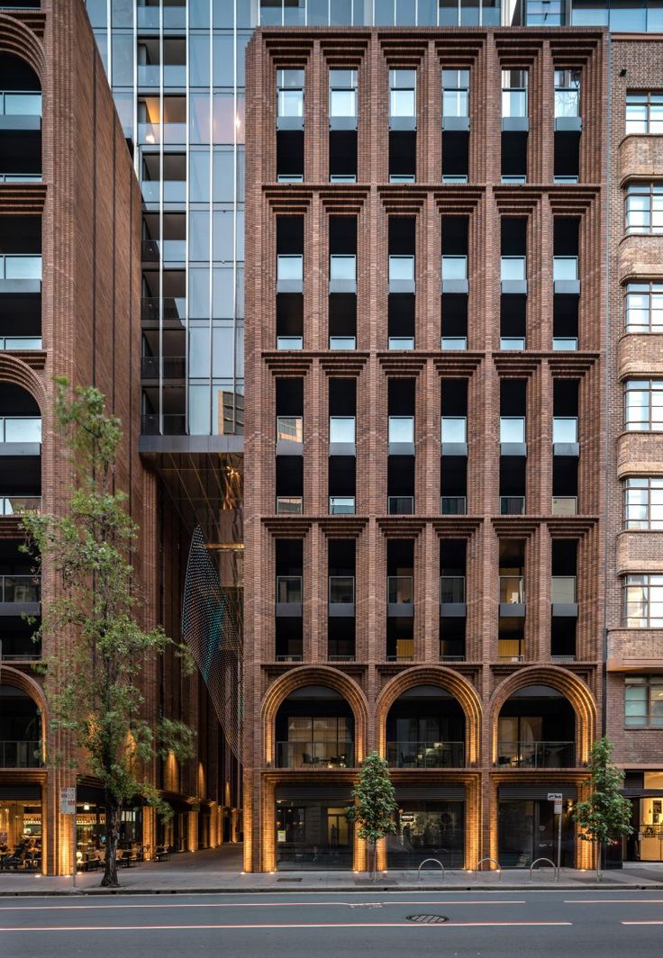 the building is made out of bricks and has arches