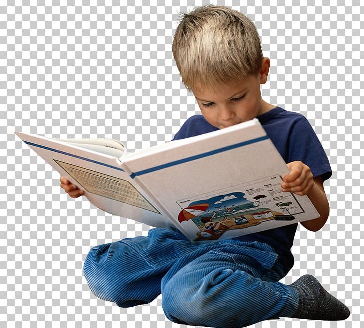 a young boy sitting on the floor reading a book, while holding an open book