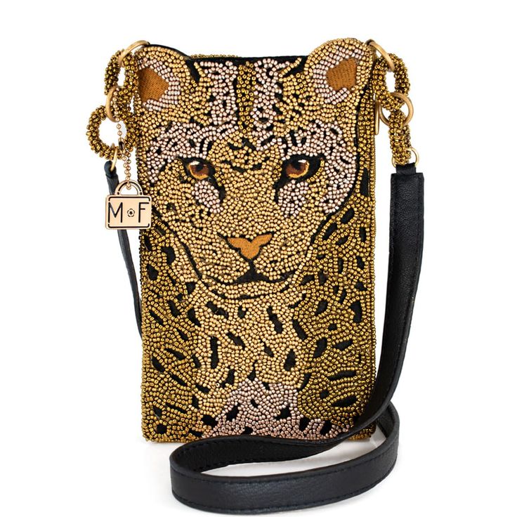 PRICES MAY VARY. Wild Style Statement: Unleash your inner fashionista with our Gone Wild Crossbody Phone Bag, featuring a fierce leopard print design that adds a bold touch to any outfit, making you stand out wherever you go. Convenient Carry: Designed for on-the-go adventures, this phone bag comes with a non-removable leather crossbody strap, allowing you to keep your hands free while you roam the urban jungle. Organized Essentials: Stay organized with a top compartment for your phone and a sid Cheetah Print Bag, Mary Frances Bags, Mary Frances Handbags, Novelty Handbags, Crossbody Phone Purse, Novelty Purses, Crossbody Phone Bag, Big Handbags, Mary Frances