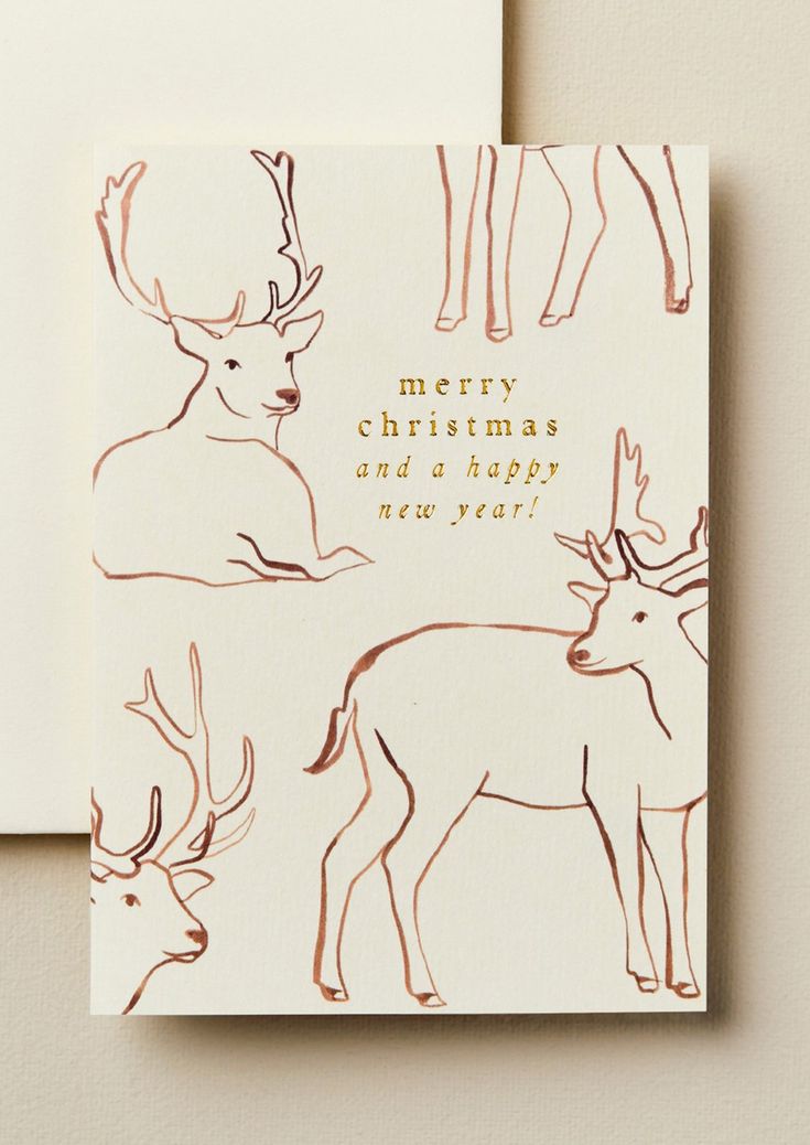 A reindeer print card reading Merry Christmas and a happy new year!. Christmas Envelope Art, Happy Christmas Card, Christmas Card Illustration, Reindeer Card, Christmas Envelopes, Merry Christmas Card Greetings, Watercolor Christmas Cards, Merry Christmas Card, East Sussex