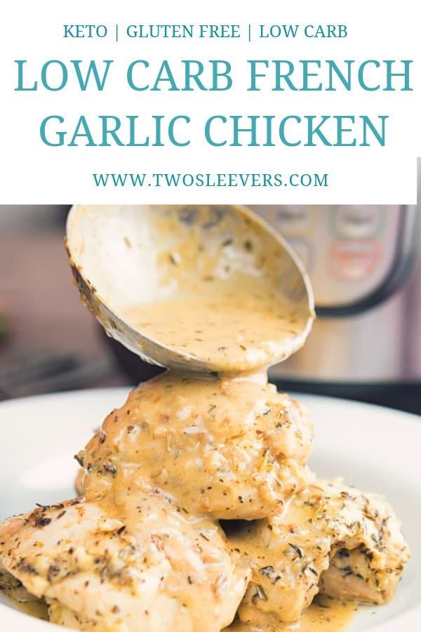 a white plate topped with chicken covered in gravy next to a can of low carb french garlic