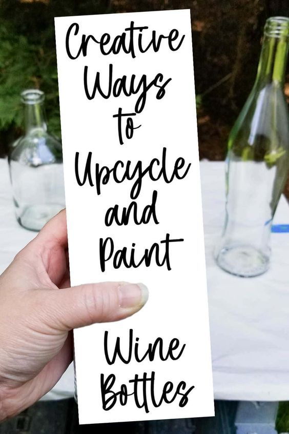 someone holding up a sign that says creative ways to upcycle and paint wine bottles