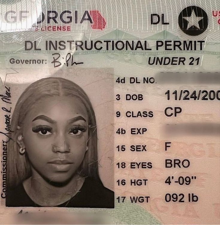 an id card with a woman's face on it