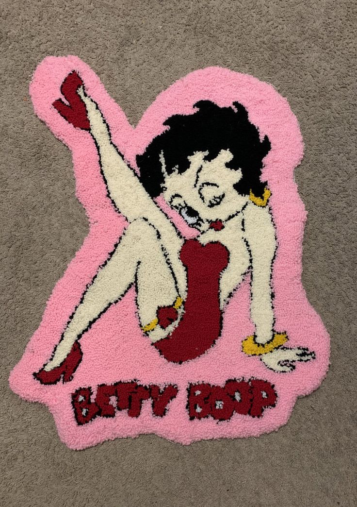 a rug with a woman on it that says betty bob