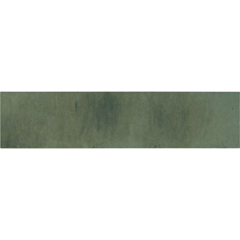 a long green piece of paper on a white background