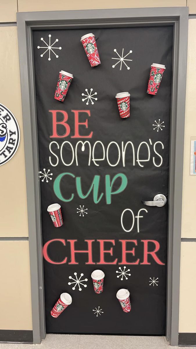 a door decorated with cups and saying be someone's cup of cheer