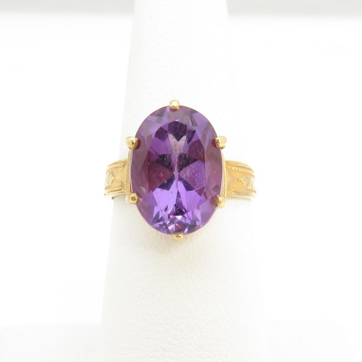 Estate 14k yellow gold large amethyst ring size 6.5. a 15mm by 10mm amethyst stone. great shape. no chips or damage. 4 grams. good size cocktail ring. Heirloom Gold Amethyst Ring With Center Stone, 14k Yellow Gold Amethyst Ring With Accent Stones, Heirloom Yellow Gold Amethyst Ring With Accent Stones, Heirloom Amethyst Ring In Yellow Gold, Heirloom Yellow Gold Amethyst Ring With Round Cut, Fine Jewelry Gold Ring With Amethyst, Heirloom Yellow Gold Amethyst Ring, Fine Jewelry Yellow Gold Amethyst Ring With Accent Stones, Yellow Gold Amethyst Ring With Accent Stones