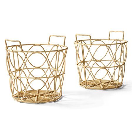 two gold wire baskets sitting next to each other