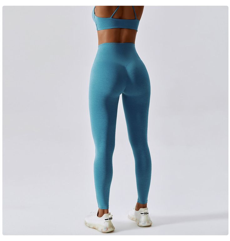 78% Nylon . 22% Spandex Built-in Bra Crisscross straps that offer intricate detailing to your look Soft. comfortable. skin friendly 4-way stretch. breathable and sweat-wicking Perfect for both sports activities and daily life Micro-elastic Seamless Leggings For Sports, Seamless High Stretch Sports Tights, Blue Nylon Yoga Pants, Blue Nylon Athleisure Yoga Pants, Blue Nylon Yoga Pants Sportswear, Sporty Micro-elastic Yoga Pants For Sports, Blue Nylon Sportswear Yoga Pants, Sporty High Stretch Tights For Sports, Blue Nylon Yoga Pants For Training