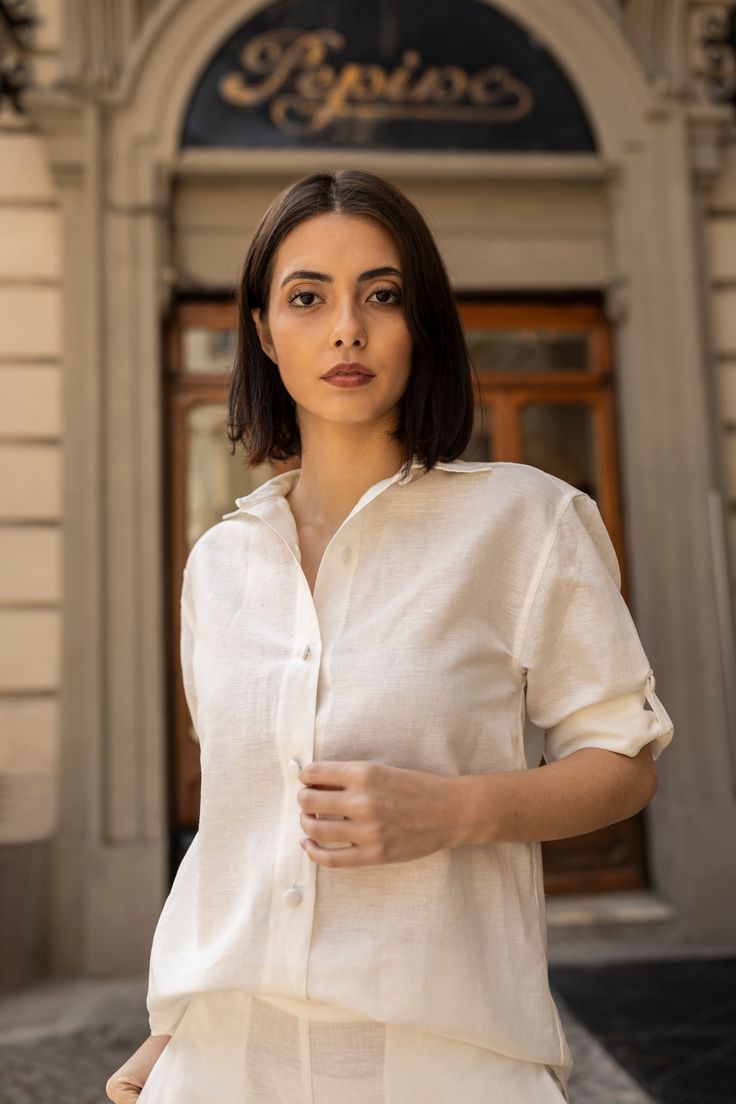 The Mary Shirt is our take on the classic button-down shirt. A dependable staple you'll return to season after season. It's cut for an oversize fit, from a lightweight cotton-linen blend and designed with dropped shoulders, long sleeves with fabric covered button cuffs and a curved hem. Cashmere Cape, Linen Shirts Women, Linen Dress Women, Capes For Women, Fabric Covered Button, Knitting Accessories, Linen Women, New Wardrobe, Teal Green