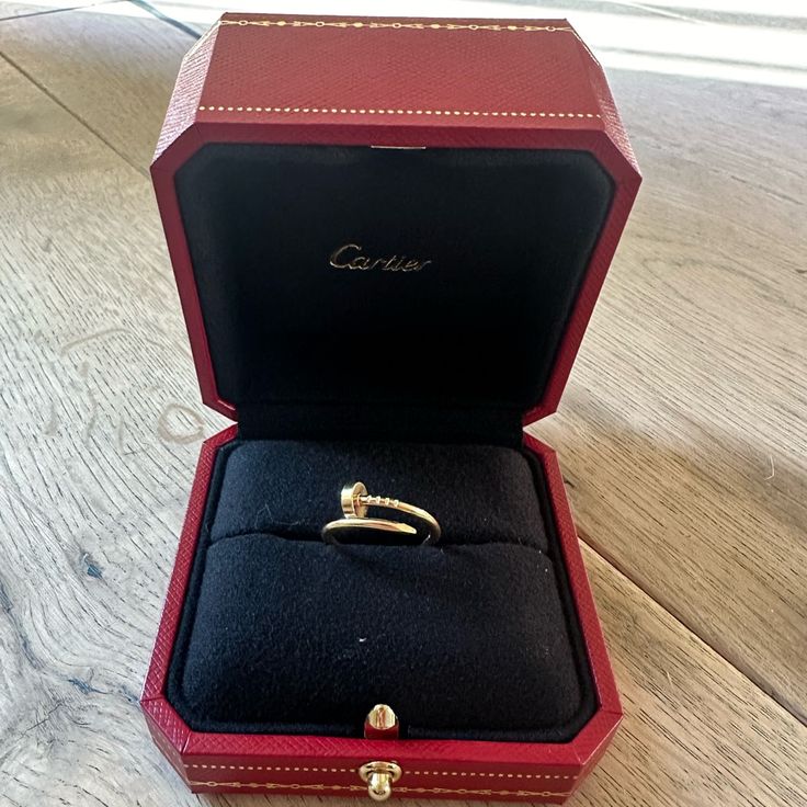 Size 50. Comes With Box, Ring, And Certificate. Yellow Gold. Cartier Yellow Gold Diamond Wedding Ring, Cartier Yellow Gold Wedding Diamond Ring, Gold Wedding Jewelry With Original Box, Cartier Gold Diamond Ring Gift, Cartier Yellow Gold Jewelry With Prong Setting, Cartier Round Cut Jewelry Gift, Cartier Hallmarked Diamond Wedding Ring, Classic Jewelry With Original Box, Hallmarked Cartier Diamond Wedding Ring