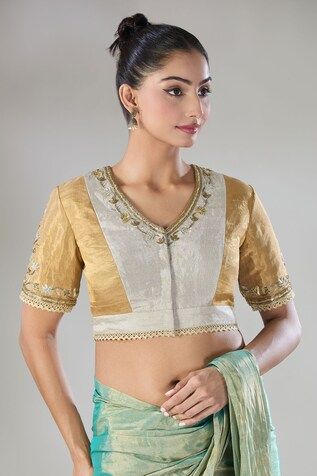 Silver and gold handwoven zari tissue embroidered blouse. - Aza Fashions Designer Gold Blouse In Cotton Silk, Gold Padded Blouse With Traditional Drape, Designer Gold Cotton Silk Blouse, Gold Art Silk Blouse For Puja, Designer Cotton Silk Gold Blouse, Gold Cotton Silk Blouse For Festivals, Gold Traditional Drape Blouse Piece With Padding, Gold Raw Silk Blouse For Navratri, Gold Anarkali Tops For Navratri