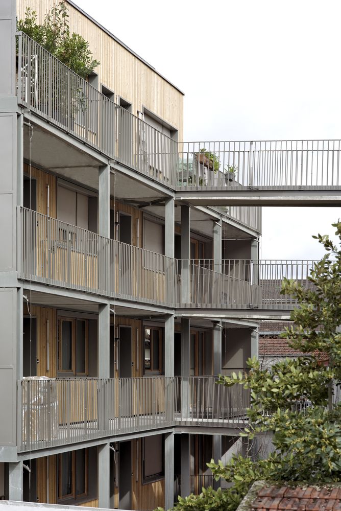 an apartment building with balconies and balconyes