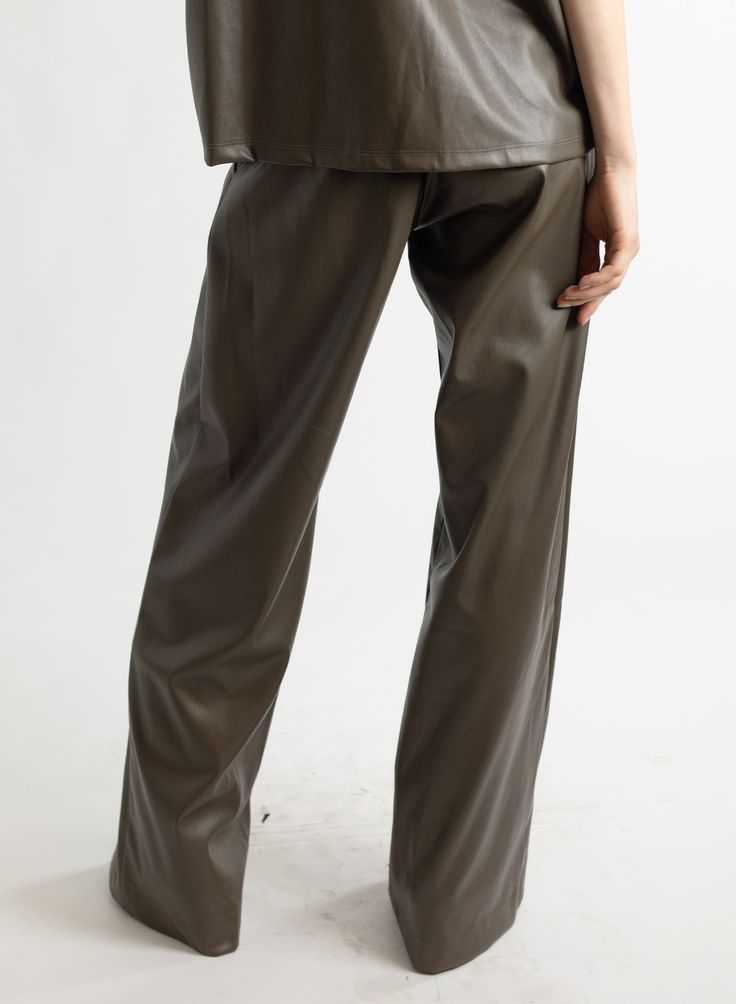 This style features: Mid-rise waist Wide leg Pleated trouser Front pockets Fly front with zipper and two buttons Fabric content: 100% PU outer Dry clean or hand wash only Designed by Meg in Brooklyn, NY. Made in the USA. Ethical Shopping, Trousers Women, Fashion Prints, Casual Pants, Brooklyn, Mid Rise, Wide Leg, Dry Clean, Hand Wash