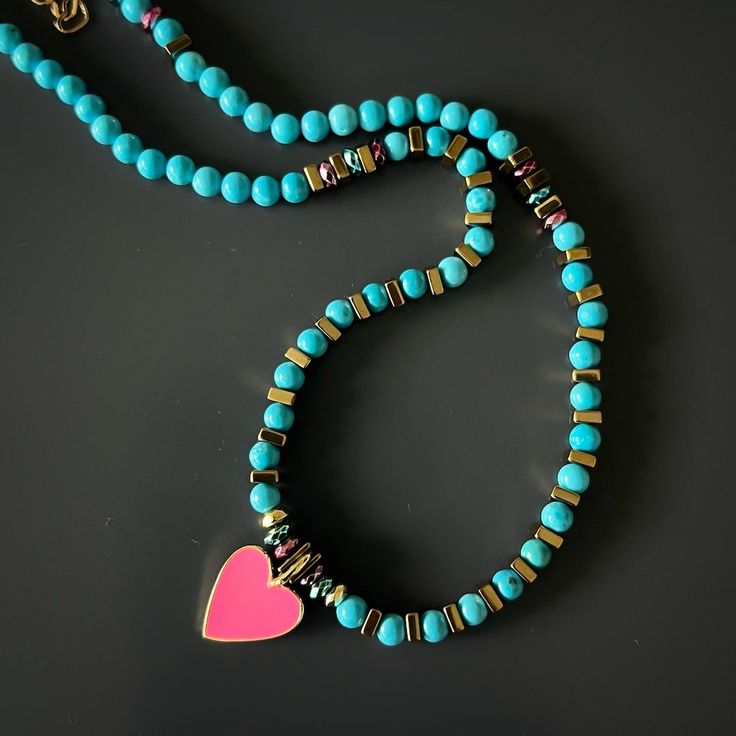 Turquoise Pink Love Choker Necklace Jewelry reflects the wearer's personality, style and outlook to life. For this reason, I believe the jewelry we wear should be meaningful and have an unique and positive vibe. With their unique design, jewelry should reflect your unique style, and with their meaning, jewelry should display your soul, personality and vibe. That's my philosophy when I design my pieces each with their own unique design, story, and meaning. With the symbols of good luck and protec Bohemian Beaded Necklaces With Heart Charm, Bohemian Necklaces With Heart Charm And Round Beads, Adjustable Turquoise Necklace With Heart Beads, Bohemian Beaded Necklace With Heart Pendant, Bohemian Beaded Necklace With Heart Beads, Bohemian Beaded Heart Necklace, Turquoise Beaded Heart Pendant Jewelry, Turquoise Heart-shaped Jewelry With Colorful Beads, Turquoise Heart-shaped Gemstone Bead Jewelry