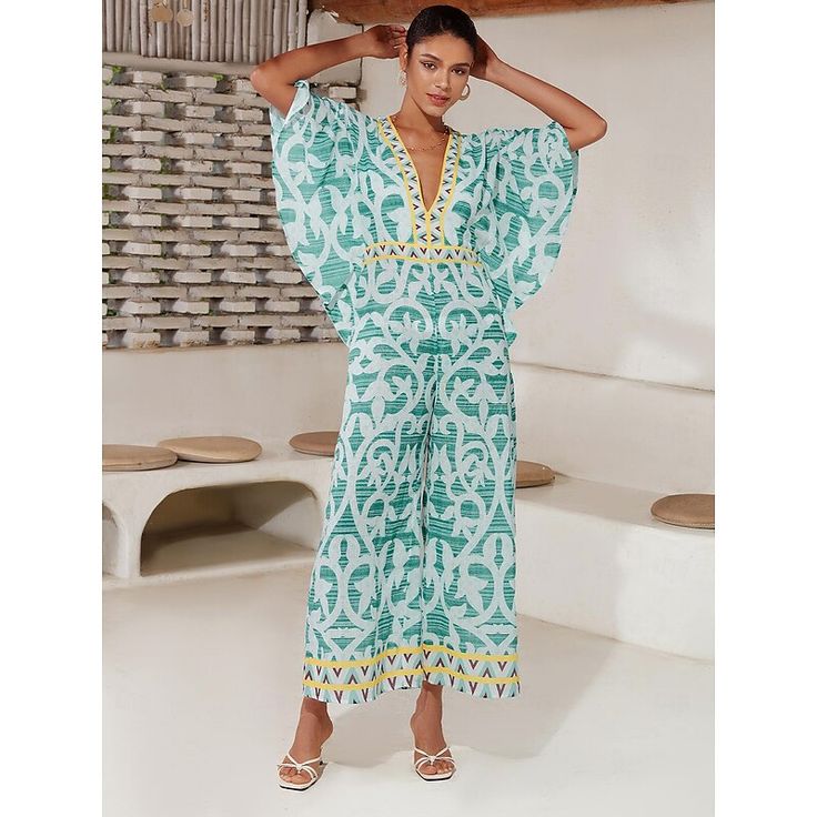 Category:Jumpsuit; Season:Spring  Summer; Fabric:Terylene; Sleeve Length:Half Sleeve; Look After Me:Washable,Wash with similar colours,Machine wash; Gender:Women's; Style:beach vacation; Elasticity:Inelastic; Occasion:beach vacation,Daily Wear; Fit Type:Loose Fit; Waistline:High ; Pattern:Folk; Design:Print; Neckline:V Neck; Sleeve Type:Magyar Sleeve; Trends:Wide-legged,Print; Pants Type:Wide Leg Pants; Jumpsuit Type:Jumpsuit; Listing Date:05/03/2024; Production mode:External produce; Bust:; Hip Tropical V-neck Jumpsuits And Rompers For Summer, Tropical V-neck Jumpsuits And Rompers For Vacation, Green V-neck Jumpsuits And Rompers For Beach Season, Summer V-neck Jumpsuits And Rompers For Vacation, Green Tropical V-neck Jumpsuits And Rompers, V-neck Tropical Print Swimwear For Summer, Printed Tropical V-neck Jumpsuits And Rompers, Tropical V-neck Printed Jumpsuits And Rompers, Printed V-neck Beachwear One Piece