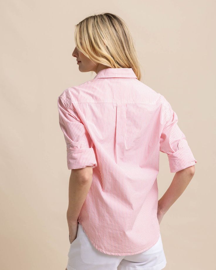 Polished and professional, this long-sleeve button-down gives you timeless style from the boardroom to the boardwalk. Our soft cotton top features a shirt tail hem and button cuffs for a custom fit that's both sophisticated and casual. Style: 10871 Business Casual Blouse With Rolled Sleeves For Spring, Classic Spring Blouse With Shirttail Hem, Classic Shirttail Hem Blouse For Spring, Classic Blouse With Shirttail Hem For Spring, Spring Relaxed Fit Dress Shirt With Placket, Relaxed Fit Dress Shirt With Placket For Spring, Classic Spring Tops With Rolled Sleeves, Classic Tops With Button Cuffs For Spring, Spring Dress Shirt With Button Cuffs For Work