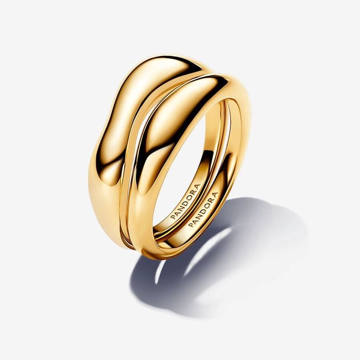 Elevate your day-to-day look with the Organically Shaped Stacking Rings. This set of two 14k gold-plated rings features organically-shaped bands with a natural look created by varied thickness, protruding areas and a slightly convex shape. When stacked together, the intentional variations in the two bands create interesting gaps between them. Whether you style them together or separately, this pair of sterling silver stacking rings is a must-have for any ring lover's collection. Pandora Organica Designer Gold Jewellery, Trendy Gold Rings, Silver And Gold Ring, Gold Ring Band, Pandora Essence, Custom Charm Bracelet, Pandora Necklace, Charms Pandora, Bracelet Pandora