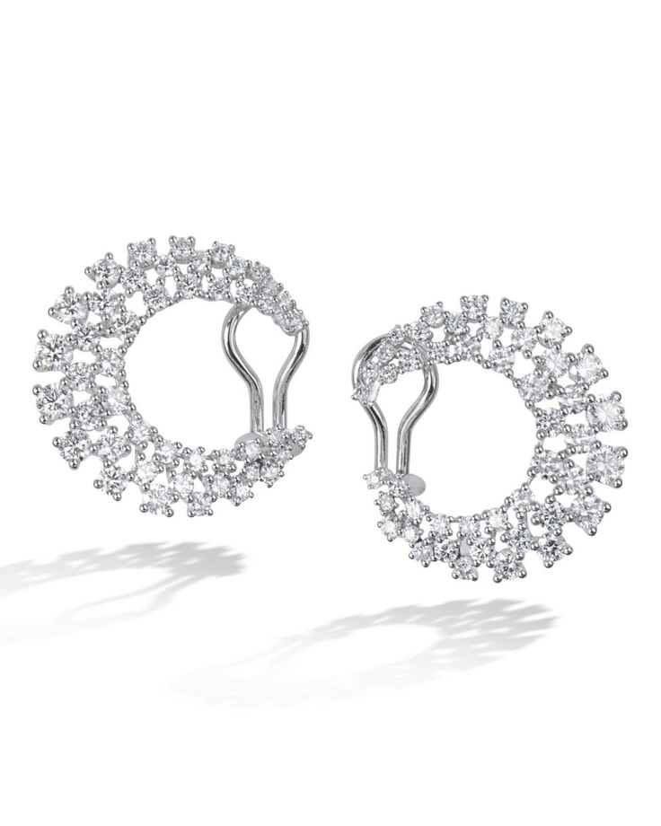 18 karat white gold crescent moon shaped clip earrings set with 92 round brilliant cut diamonds (2.76 CTW). Fine Jewelry Round Diamond Clip-on Earrings, Fine Jewelry Round Clip-on Diamond Earrings, Silver Diamond Clip-on Earrings, Fine Jewelry Diamond Clip-on Earrings, Round Clip-on Diamond Earrings Fine Jewelry, Silver Clip-on Diamond Earrings, White Gold Clip-on Diamond Earrings With Cubic Zirconia, White Gold Cubic Zirconia Clip-on Diamond Earrings, Clip-on Cubic Zirconia Earrings In White Gold