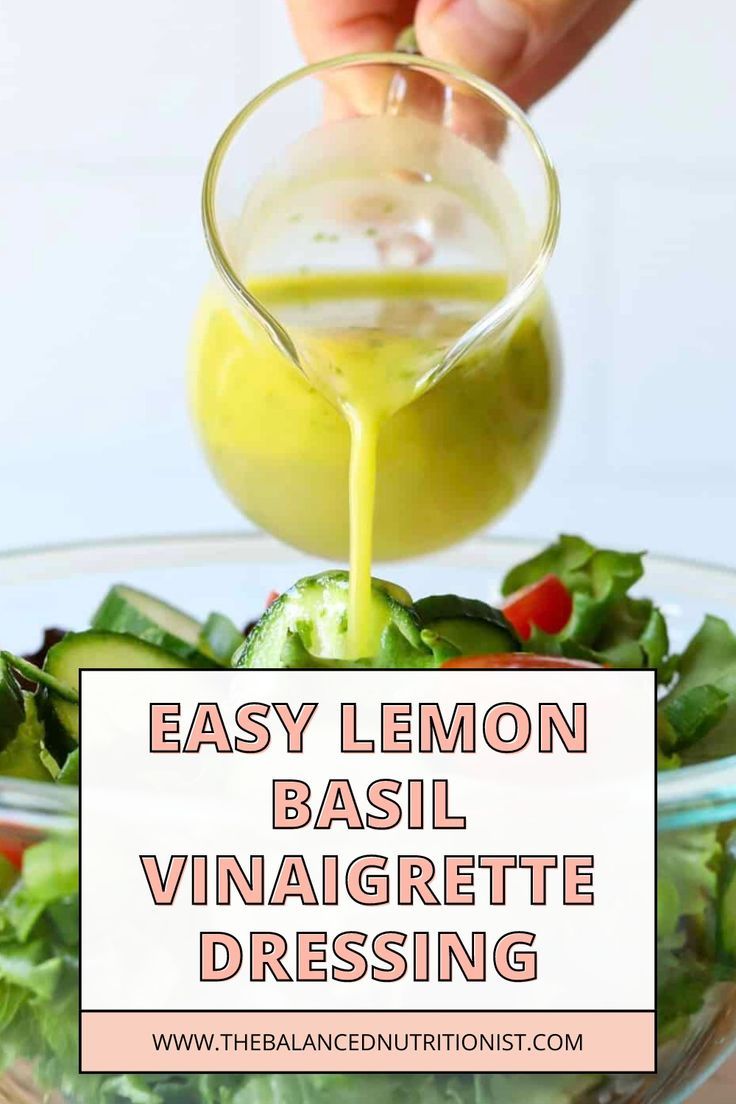 someone is pouring dressing into a salad in a bowl with the words easy lemon basil vinaigrette dressing