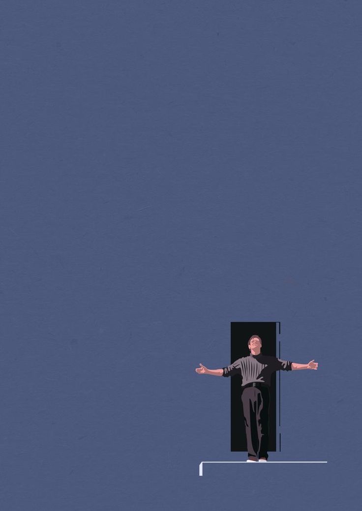 a man standing on top of a white line with his arms outstretched in the air