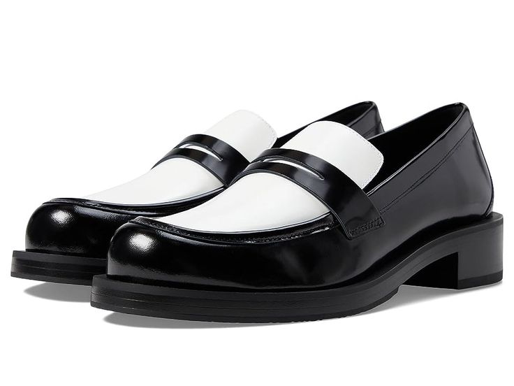 Stuart Weitzman Palmer Bold Loafer - Women's Shoes : Black/White : Give your style a classy update with the ultra-modern Stuart Weitzman Palmer Bold Loafers that offer uncompromising quality and a sleek look. The loafers are designed with a round toe shape and block heel. Crafted with a leather upper, leather lining, and leather insole in the highest quality, the loafers guarantee both comfort and d\urability. Slip-on style. Signature branding on the insole. Synthetic outsole. Made in Spain. Mea Classic Formal Platform Loafers With Contrast Sole, Modern Almond Toe Platform Loafers For Work, Modern Formal Platform Loafers With Contrast Sole, Modern Business Platform Loafers With Contrast Sole, Modern Almond Toe Platform Loafers For Business, Luxury Loafers With Contrast Sole For Work, Modern Business Platform Loafers With Almond Toe, Modern Formal Platform Loafers For Fall, Classic Platform Loafers With Contrast Sole For Work