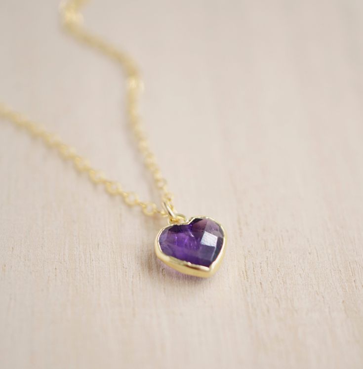 Give yourself some love or show your love for that special someone in your life with this heart necklace!Amethyst is believed to carry the energies of passion, creativity, and spirituality. It's also said to assist with temperance and sobriety, as well as inflammation.This necklace is handcrafted with a purple Amethyst faceted heart pendant. Each stone is natural and therefore contains natural inclusions or crystal formations. They are edged in 24k gold or silver electroplate. STONE SIZE: averag Heart Cut Amethyst Jewelry For Gifts, Heart Pendant Amethyst Jewelry As Gift, Heart Shaped Amethyst Pendant Jewelry As Gift, Amethyst Heart Pendant Jewelry As Gift, Purple Heart Charm Jewelry Gift, Valentine's Day Amethyst Jewelry Gift, Amethyst Heart Charm Jewelry For Gifts, Amethyst Jewelry With Heart Charm As A Gift, Amethyst Heart Charm Jewelry As A Gift