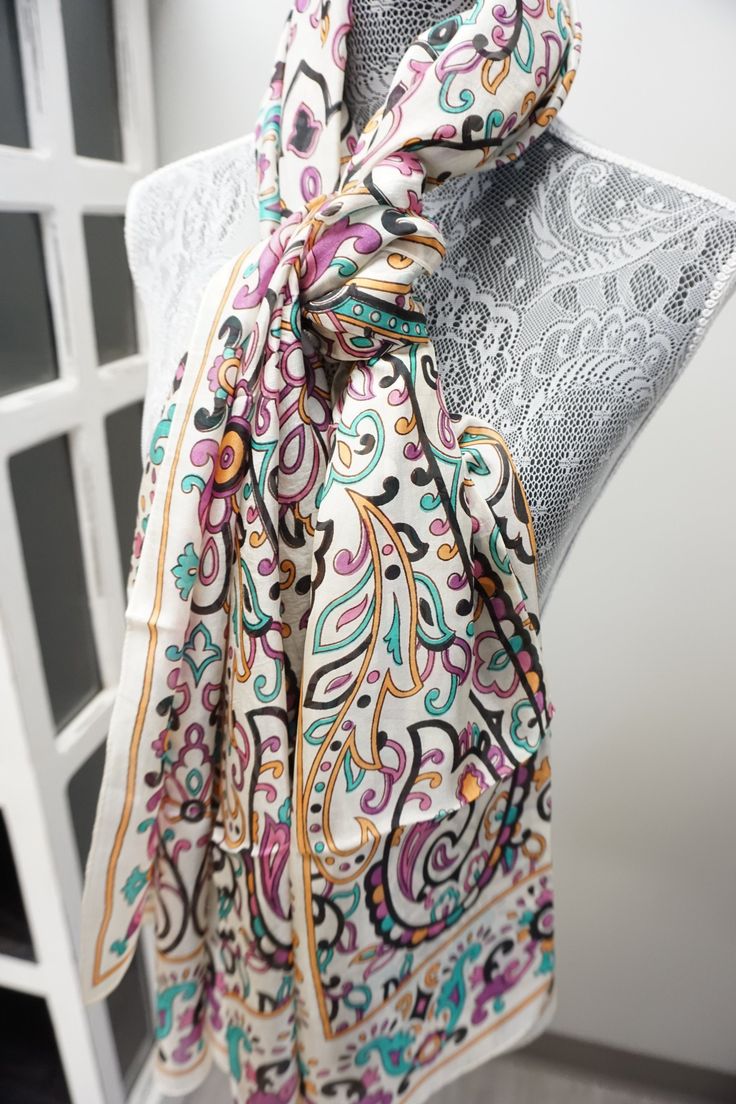 In a signature diaphanous floral print, this super soft Silk Scarf brings easy elegance to anything you wear it with. Big enough to wear as a wrap but fine enough to gather up and wear as a scarf. This tissue-weight scarf is made from a super soft silk blend in a variety of prints. One of a kind, unique individual piece. ** 72”x36” ** Hand Made ** 100% Silk ** Dry Clean only Product Type Premium Silk Scarves Overall 72"x36" Overall Product Weight 0.2 lbs Materials Silk Material Detail 100% Silk Kantha Sari, Block Printed Textiles, Silk Scarf Wrap, Block Printing, Silk Material, Fancy Outfits, Classic Collection, Silk Scarves, Textile Prints