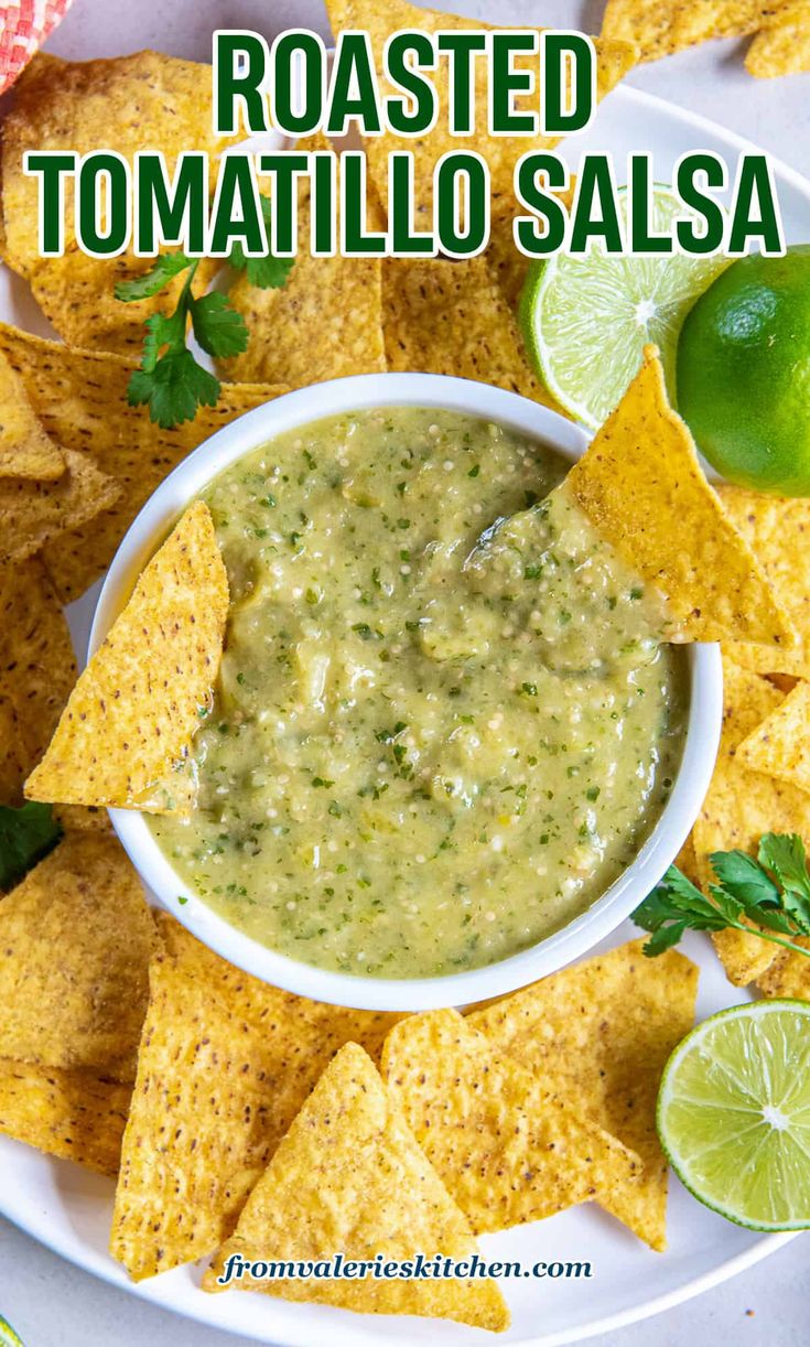 a white plate topped with salsa and tortilla chips