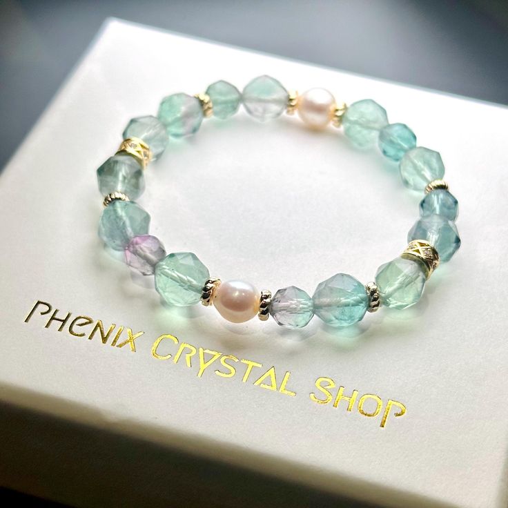 Masterpiece of nature's finest gems - Fluorite & Pearl Bracelet !! Soothing sea-green fluorite meets lustrous pearls in perfect harmony. Handcrafted with gold-plated accents for a touch of luxury. ---------------------- Product Details:  - Around 7-9mm Bead Size The bracelet is design in 15.5-16cm, if you need to adjust the size please let us know :)  EMBRACE THE CREATION OF MOTHER NATURE Every piece of crystal is the creation of nature, there might be slightly difference and nature inclusion. W Gem Bracelets, Bracelets Design, Gems Bracelet, Design Bracelet, Green Fluorite, Pearl Design, Bracelet Design, Perfect Harmony, Crystal Shop