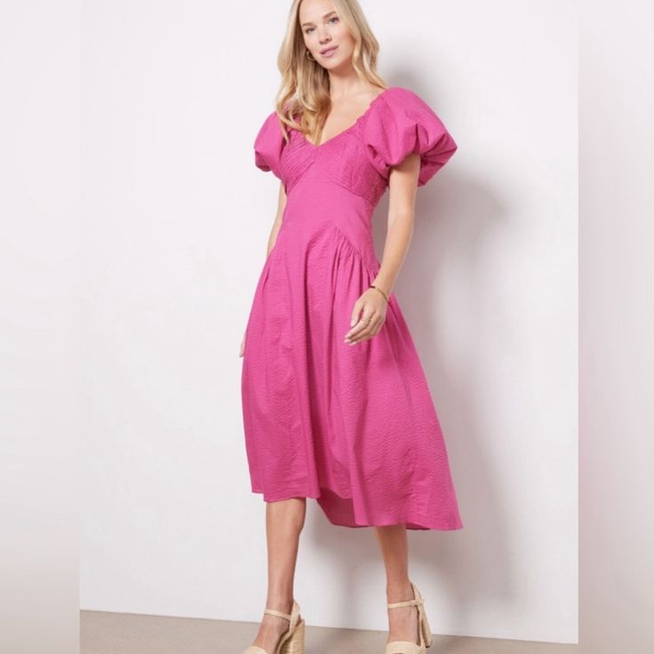 Nwt Frame Puff Sleeve Dress Xsfuchsia Textured Midi Dress With Voluminous Puff Sleeves, A Shirred Bodice, And A High-Low Hem. Frame Cotton Midi Dress Featuring A Ruched Bodice And Short Puffed Sleeves A-Line Silhouette Flounce Hem Back Zipper Midi Dress V-Neckline & Back Short Puff Sleeve Shirred Bodice Back Zip Closure Gathered Sides High-Low Hem Textured Fabrication 100% Cotton Classic Fit Dry Clean, Machine Wash Cold Style: Lwwd0702 Retail: $498 Measured Flat; Bust: 16.5” Waist: 14” Hip: 21.5 Pink V-neck Puff Sleeve Dress With Gathered Sleeves, Pink Puff Sleeve Midi Dress For Brunch, Pink Knee-length Puff Sleeve Ruched Dress, Summer Pink Midi Dress With Gathered Sleeves, Pink Summer Midi Dress With Gathered Sleeves, Pink Midi Dress With Gathered Puff Sleeves, Chic Pink Knee-length Puff Sleeve Dress, Chic Pink Midi Dress With Gathered Sleeves, Casual Pink Midi Dress With Gathered Sleeves