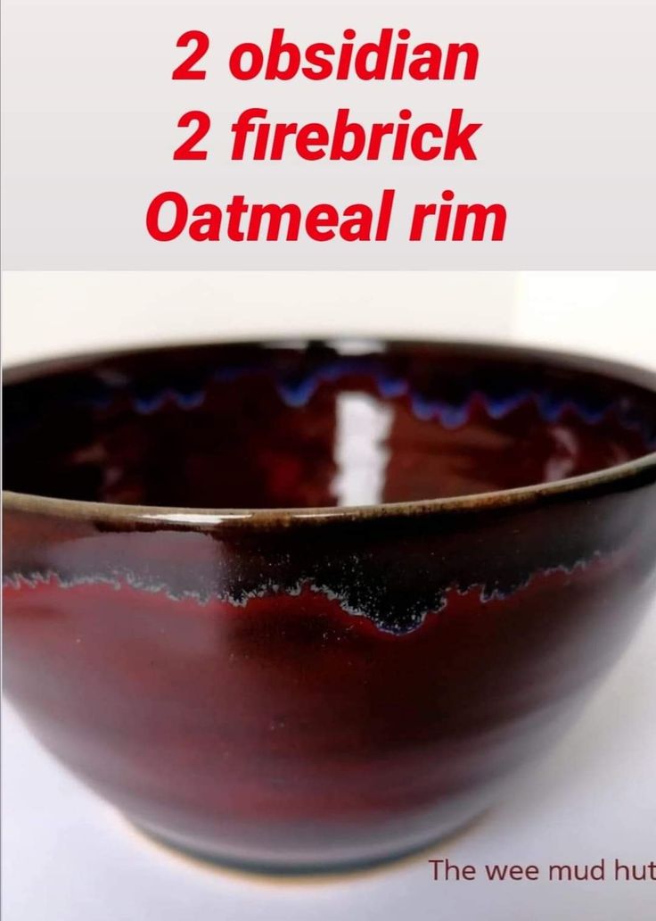 a red bowl sitting on top of a table next to a white background with the words, 2 obsidician 2 fire brick oatmeal rim