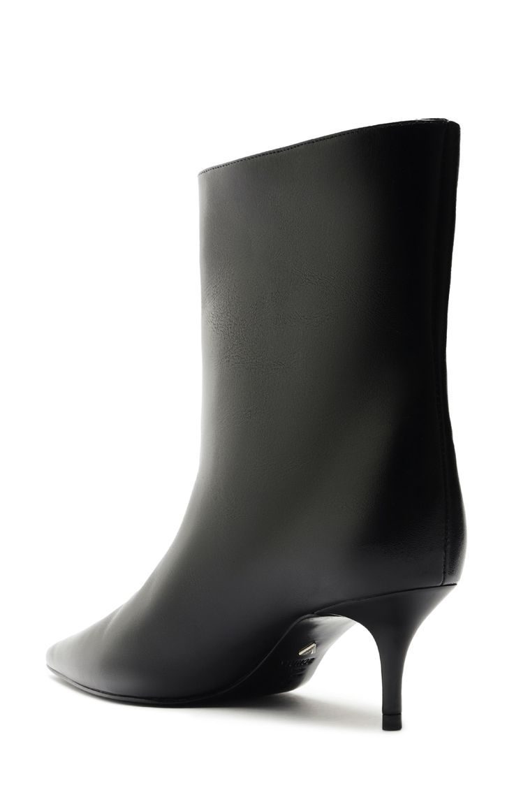 A pointy toe and tapered heel balance a sleek leather bootie that will complement your polished looks. 2 1/4" heel Pull-on style Leather upper, lining and sole Made in Brazil Classic Pointed Toe Boots With 4-inch Heel, Sleek Mid-calf Boots With Reinforced Heel, Calf Leather Heeled Boots With 4-inch Pointed Toe, Sleek Heeled Boots With 4-inch Heel For Formal Occasions, Classic Pointed Toe Mid-calf Boots For Work, Calf Leather Boots With Sculpted Heel And Pointed Toe, Calf Leather Boots With 4-inch Heel And Pointed Toe, Chic Mid-calf Boots With Pointed Toe And Leather Sole, Classic High Ankle Boots With Sculpted Heel