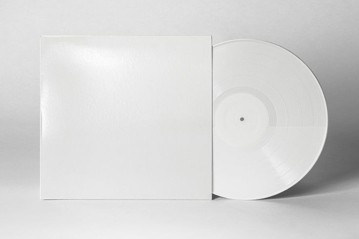 an empty white vinyl album on a gray background