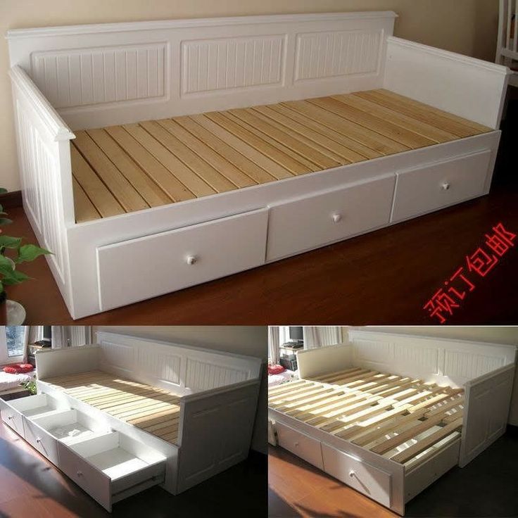 there is a bed with drawers on the bottom and bottom, but no headboard