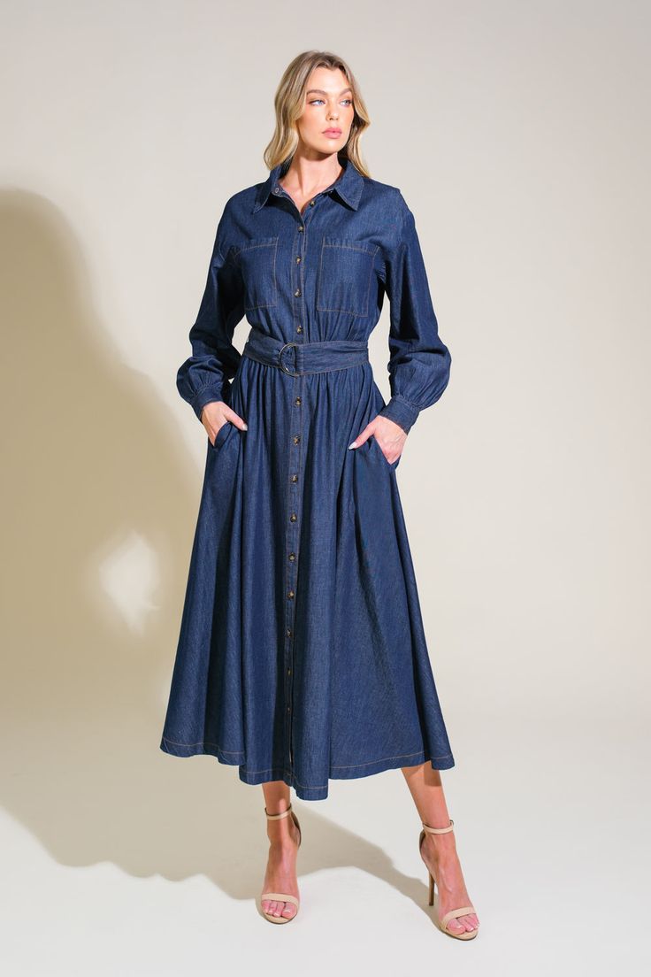 A light weight denim midi dress featuring shirt collar, button down, front pockets, long sleeve, self belt and full skirt Details: Self : 100% Cotton Size & Fit - Model is 5`8" And Wearing Size Small- Measurements Taken From Size Small- Approx. Length: 50" Indigo Long Sleeve Denim Dress With Pockets, Denim Blue Long Sleeve Dress With Buttoned Pockets, Medium Wash Long Sleeve Shirt Dress With Pockets, Indigo Long Sleeve Dress With Pockets, Denim Blue Workwear Dress With Buttoned Pockets, Collared Dark Wash Dress With Pockets, Indigo Denim Dress For Work, Chic Belted Button-up Denim Dress, Collared Medium Wash Shirt Dress For Work