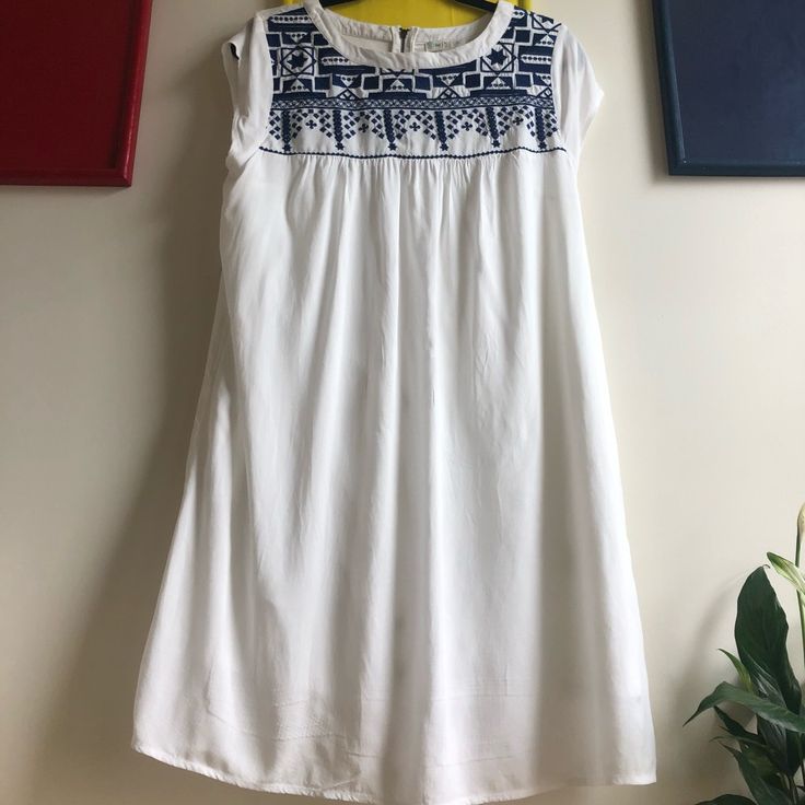 Beautiful White Dress,With Exquisite Embroidery On Top.Has Pockets,Which Give It A Casual ,Cute Vibe.Long Back Zipper And Fully Lined . White Short Sleeve Embroidered Dress With Geometric Pattern, White Geometric Embroidered Short Sleeve Dress, White Short Sleeve Dress With Geometric Embroidery, White Embroidered Dress With Short Sleeves, White Cotton Dress With Geometric Embroidery, White Embroidered A-line Summer Dress, White A-line Embroidered Summer Dress, White Embroidered A-line Dress For Summer, White A-line Embroidered Dress For Summer