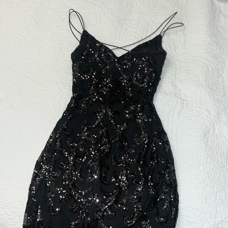 Black Shiny Party Dress From Windsor Brand New Black Sequined Mini Dress For Prom, Black Sleeveless Mini Dress For Evening, Black Mini Dress With Spaghetti Straps For Party Season, Black Mini Dress For Prom Evening, Black Sleeveless Party-ready Dress, Black Mini Dress For Date Night And Holidays, Black Fitted Mini Dress For Holiday Party, Black Spaghetti Strap Dress For Party Season, Holiday Evening Mini Dress With Spaghetti Straps