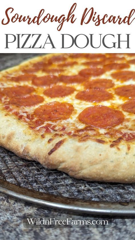 a pizza sitting on top of a metal pan covered in cheese and pepperoni slices